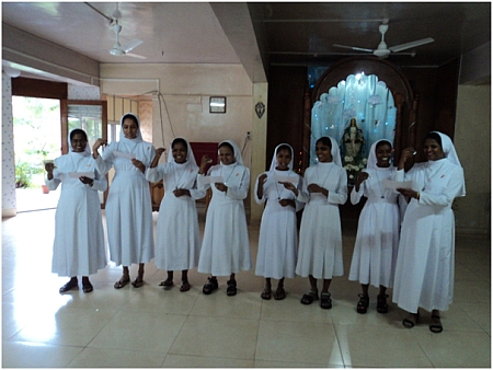 sisters wishing the jubilarians with silver bells
